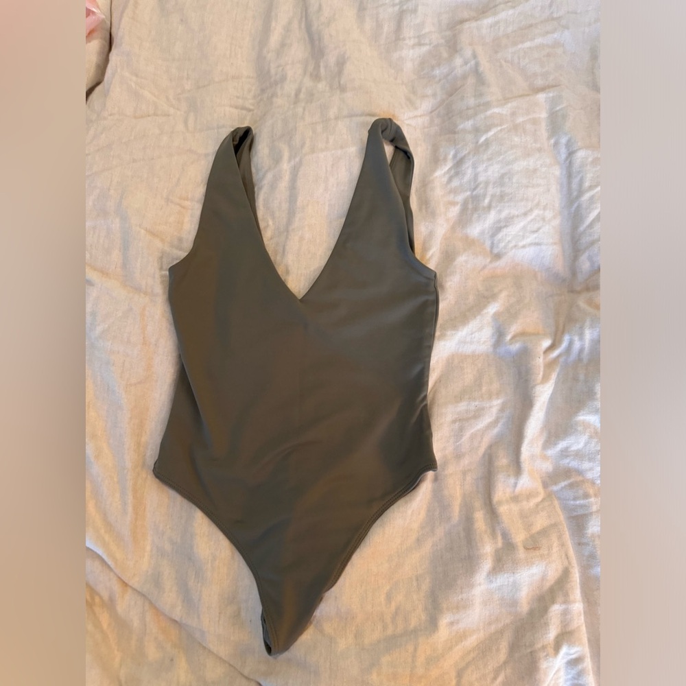 Aritzia Babaton v neck body suit. Color is grey green/slate, size S.